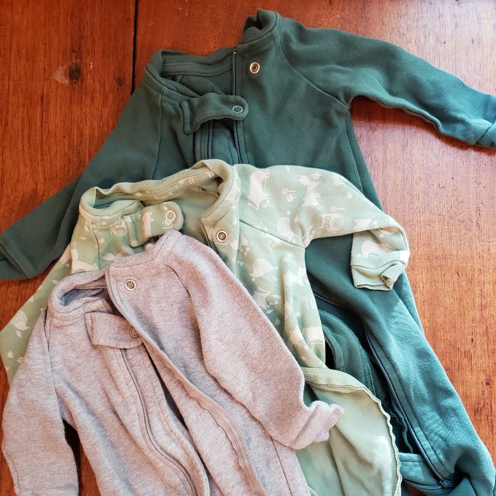 Three Pact footie pajamas